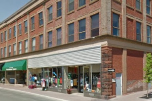 Square red brick professional centre building.